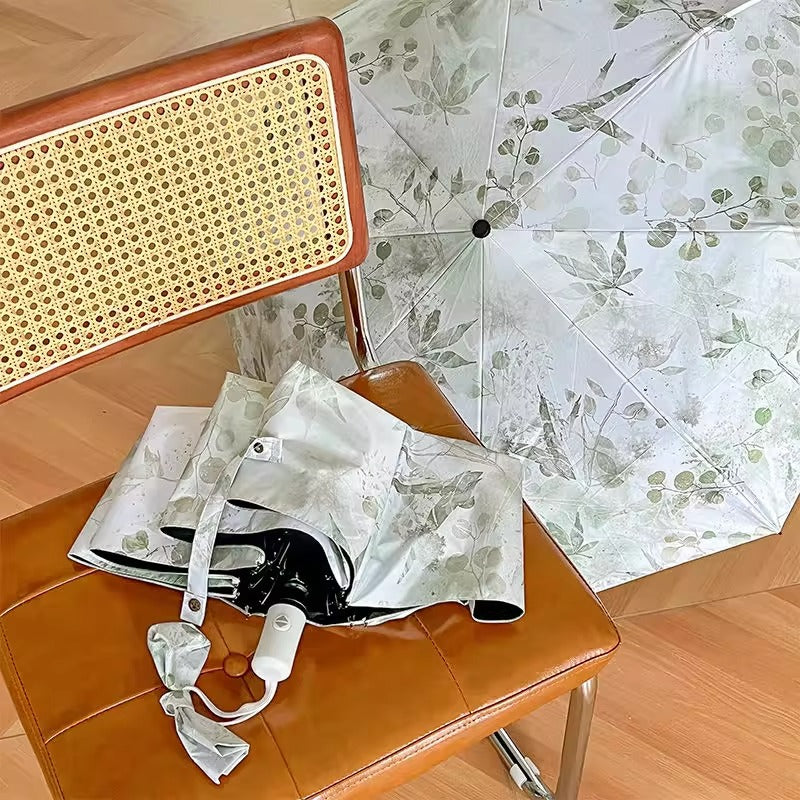 Damer Faltparaply med botanisk trykkdesign Luvikno