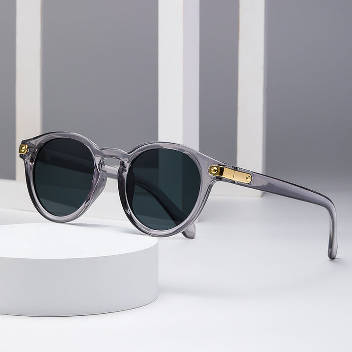 Dame moteriktig solbrille med transparent ramme og robuste glass Luvikno