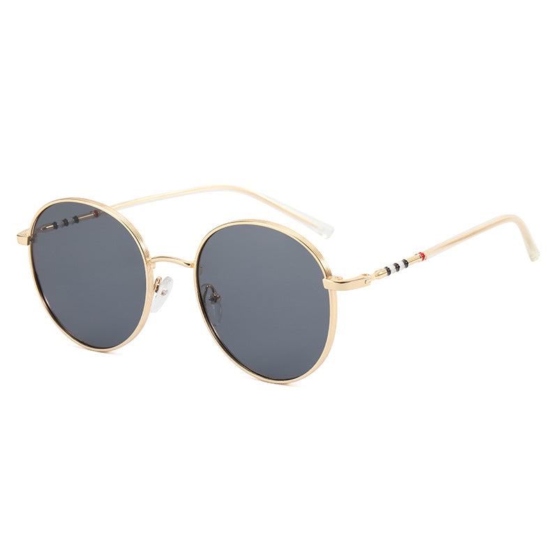 Dame moterunde solbriller med elegant metallramme Luvikno