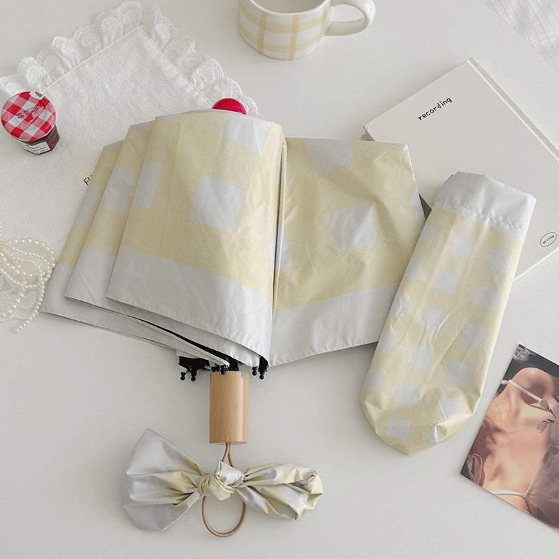 Dame sammenleggbart paraply med spesiell design Luvikno