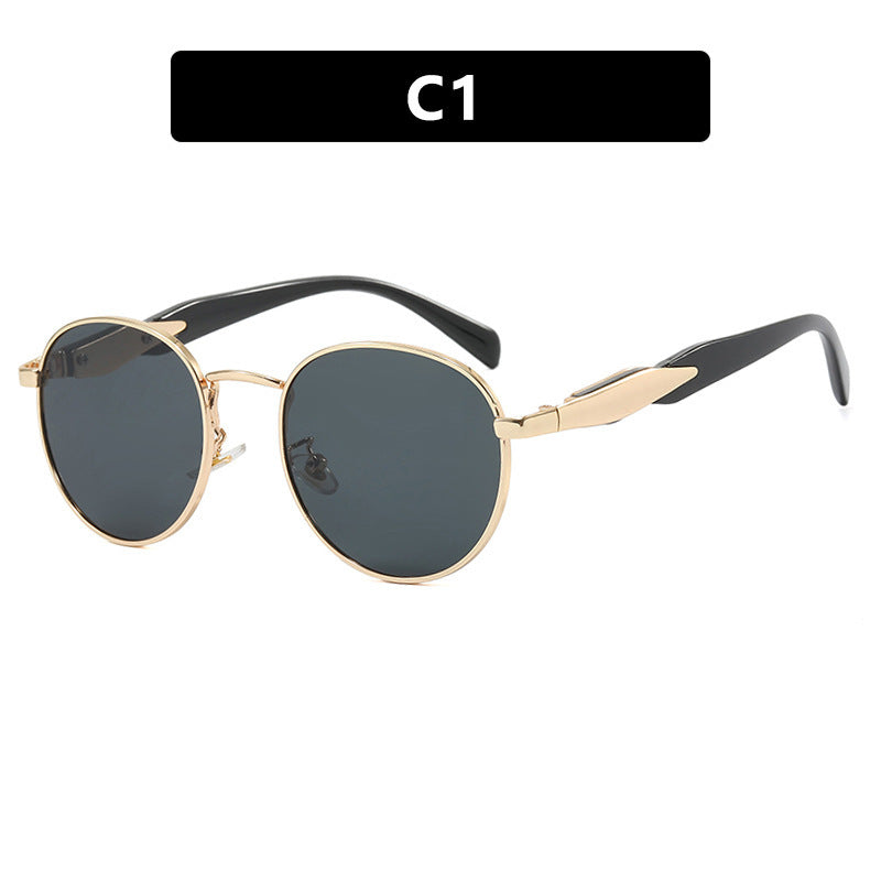 Dame rund solbrille med elegant, gullramme og UV-beskyttelse Luvikno