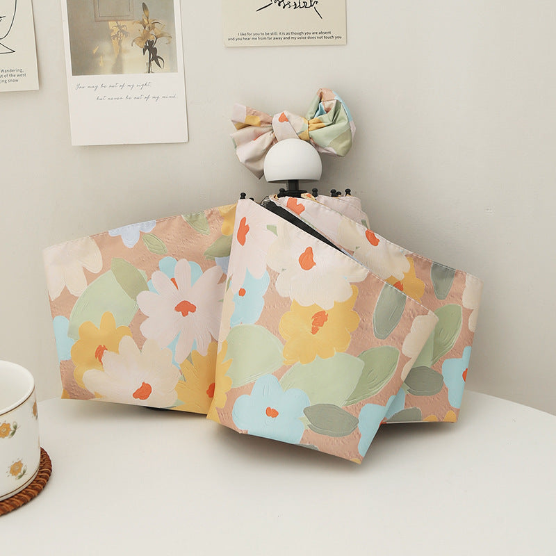 Dame sammenleggbar paraply med kreativt blomsterdesign og automatisk åpningsmekanisme Luvikno