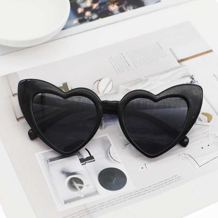 Dame hjerteformet solbrille med glitrende ramme Luvikno