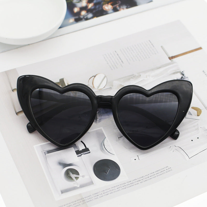 Dame hjerteformet solbrille med glitrende ramme Luvikno
