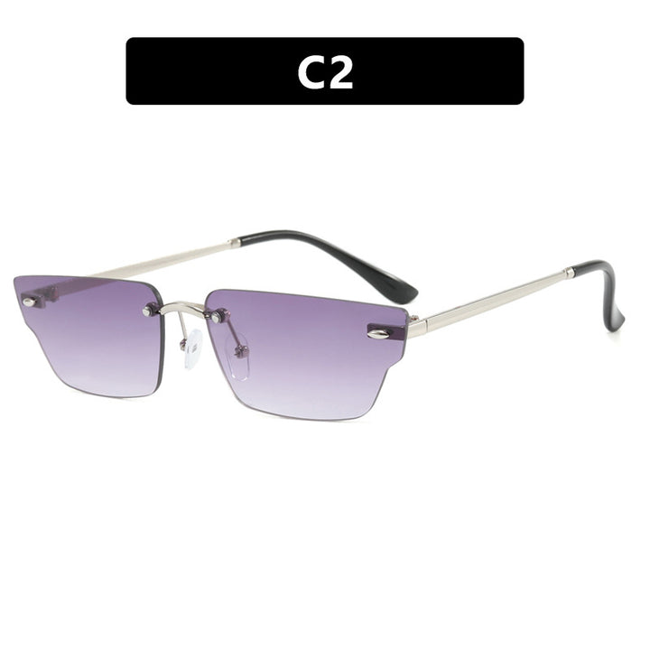 Dame geometrisk solbrille med filigranramme og transparente glass Luvikno