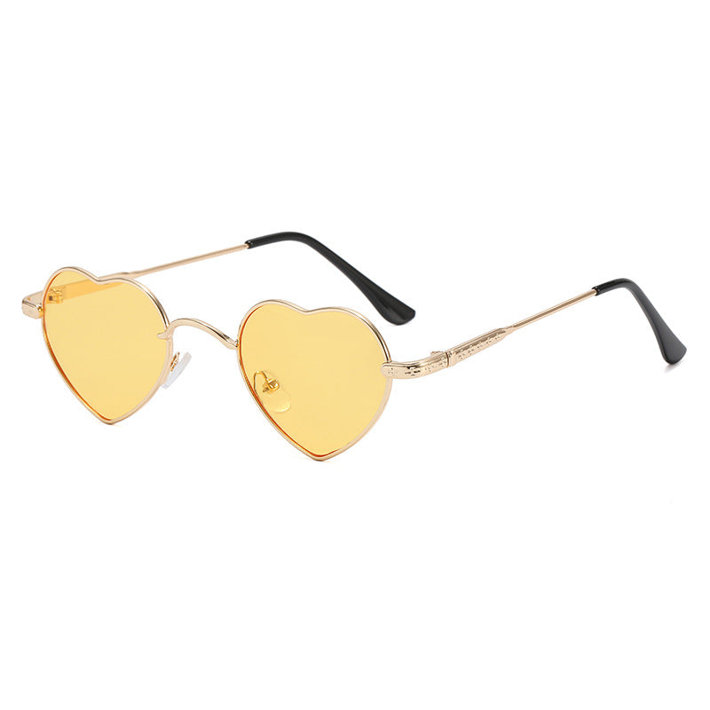 Damer hjerteformet solbrille med filigran metallramme Luvikno