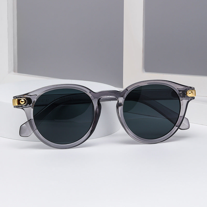 Dame moteriktig solbrille med transparent ramme og robuste glass Luvikno