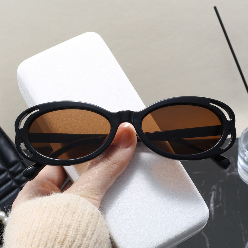 Damen modische solbrille med oval ramme og unikt design Luvikno