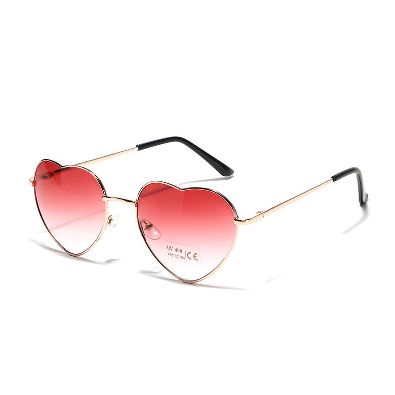 Dame hjerteformet solbrille med UV-beskyttelse og delikat ramme Luvikno