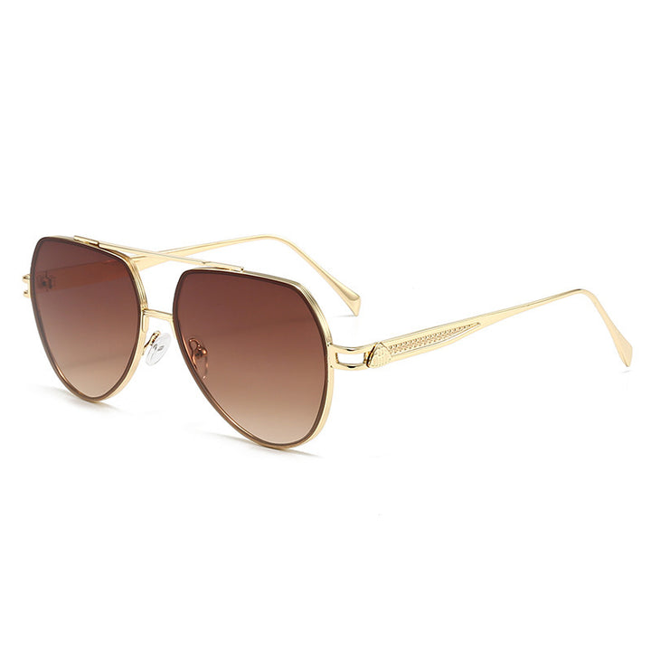 Dame Designer-solbrille i stilfull, bølget metallramme Luvikno