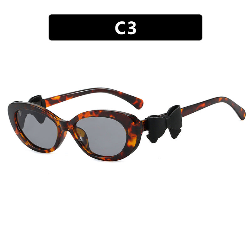 Dame moteriktig solbrille med lekent sløyfedesign Luvikno
