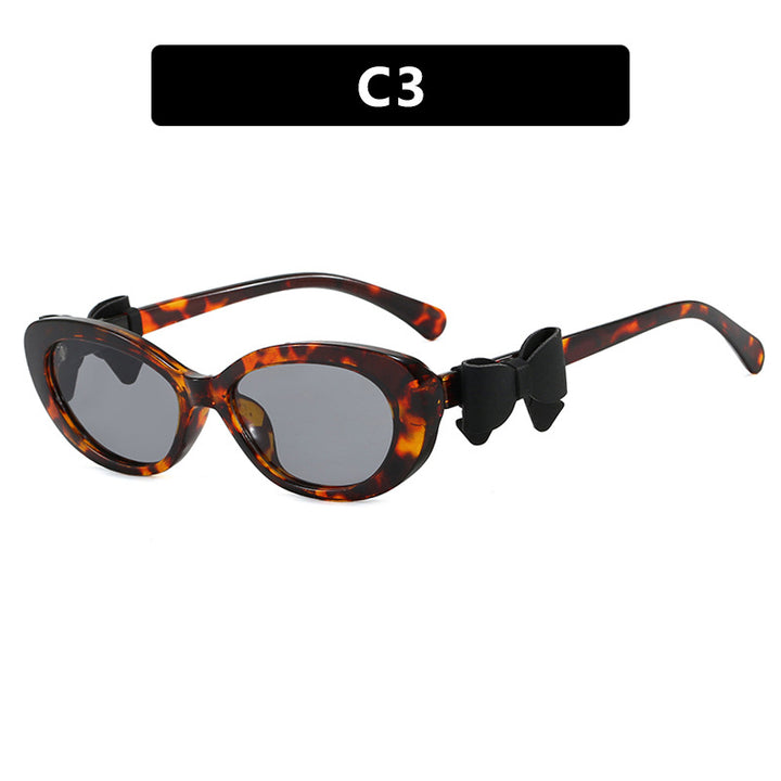 Dame moteriktig solbrille med lekent sløyfedesign Luvikno