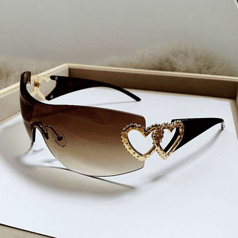 Dame designer-solbrille med luksuriøs hjerte-akseent Luvikno