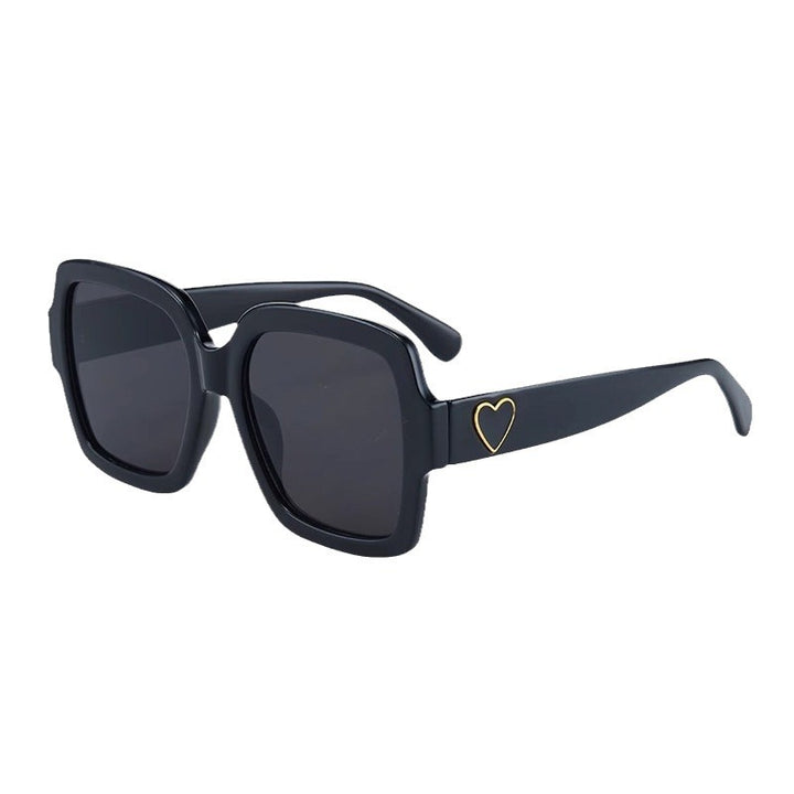Dame Modemessig solbrille med eksklusiv hjerte-detalj Luvikno