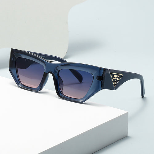 Dame Designer solbrille med moderne, geometrisk ramme Luvikno