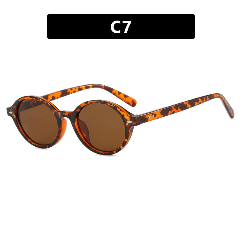 Dame rund solbrille med moderne design og polariserte glass Luvikno