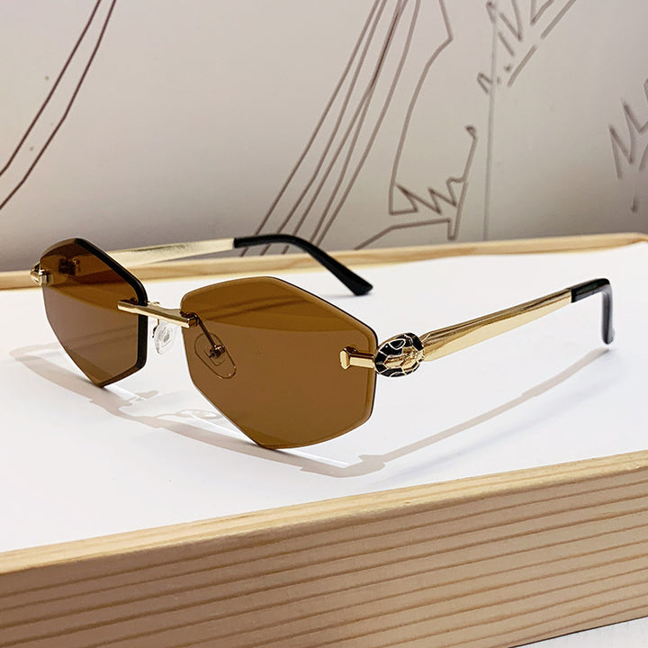 Dame Designer solbrille med heksagonal ramme og gyldne detaljer Luvikno