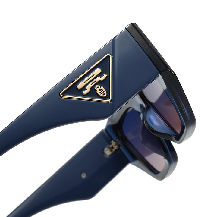 Dame Designer solbrille med moderne, geometrisk ramme Luvikno