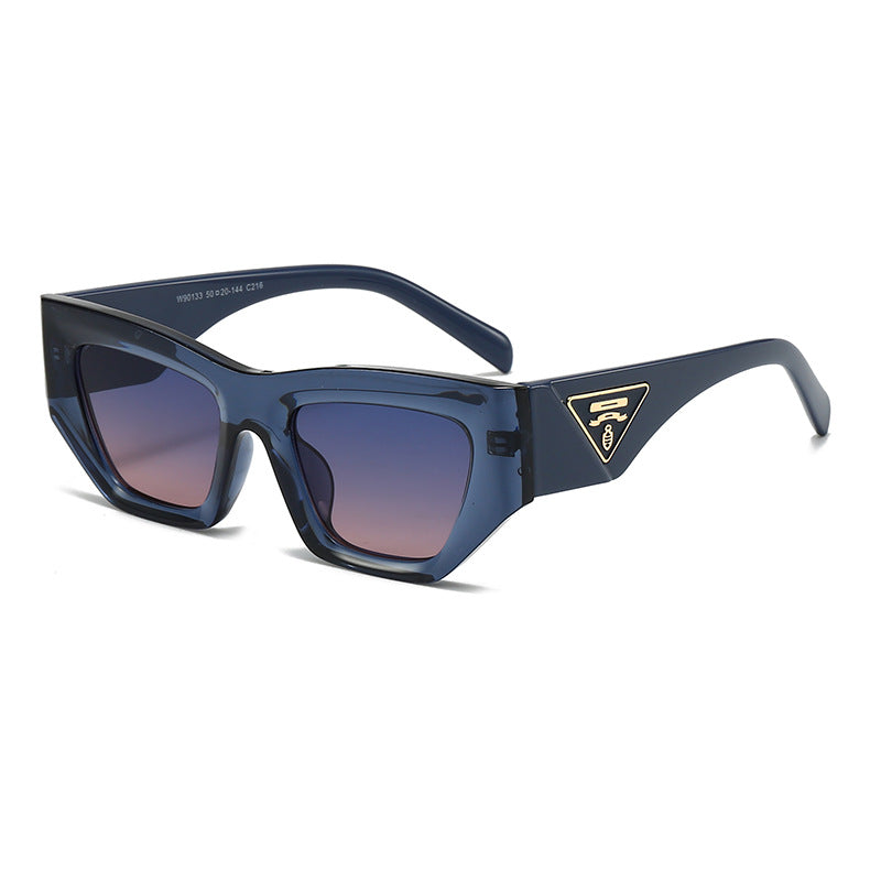 Dame Designer solbrille med moderne, geometrisk ramme Luvikno