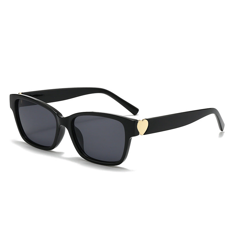 Dame moterik kvadratisk solbrille med hjerte-senter Luvikno
