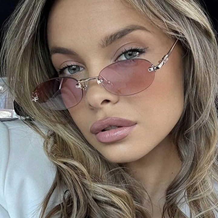 Dame moterimessig solbrille med oval ramme og elegante aksenter Luvikno