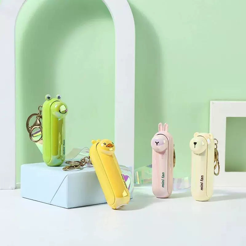 Unisex enhetsstørrelse oppladbar nøkkelring håndholdt mini-vifte med håndleddsstropp og ny art frosk charm Luvikno