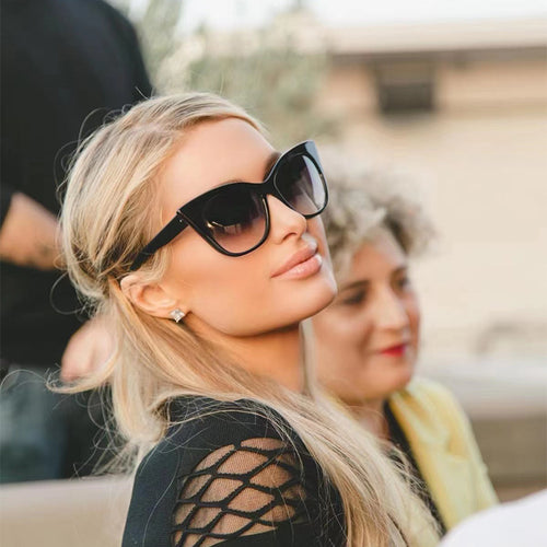 Dame solbrille i trendy katteøye-design med iøynefallende leopardmønster Luvikno