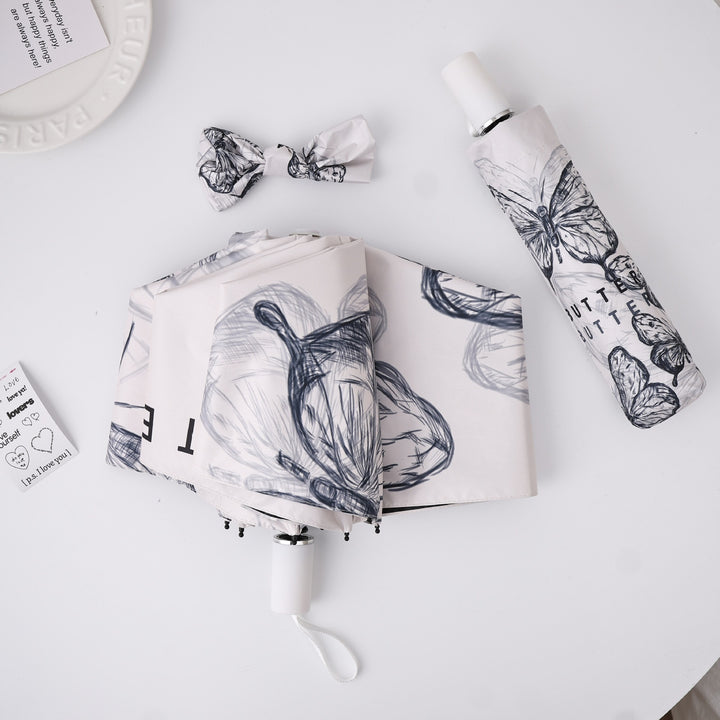 Dame fashionable foldeparaply med leken design Luvikno
