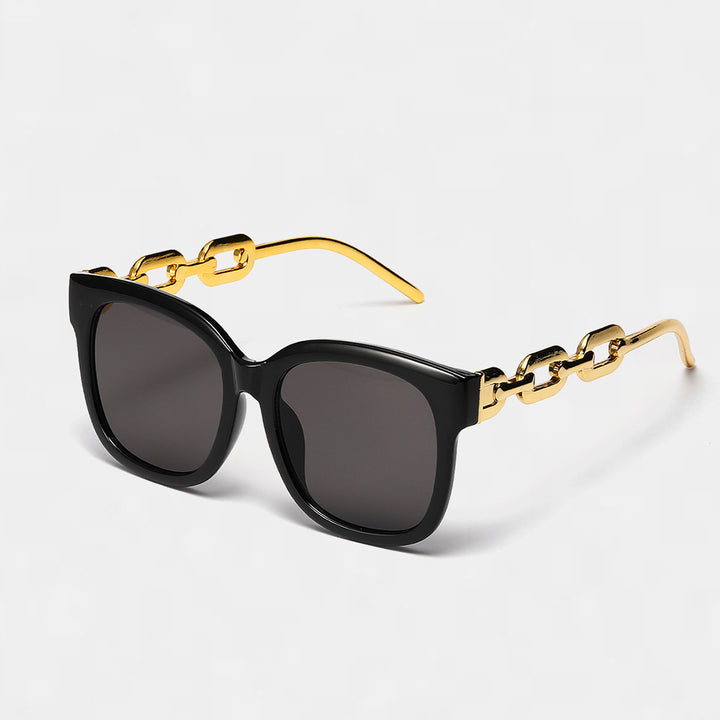 Dame moteriktig oversized solbrille med luksuriøs kjedeinnramming Luvikno