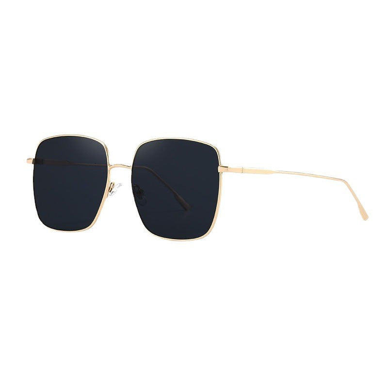 Dame solbrille med moderne firkantet rustfritt stålramme og polarisert glass Luvikno