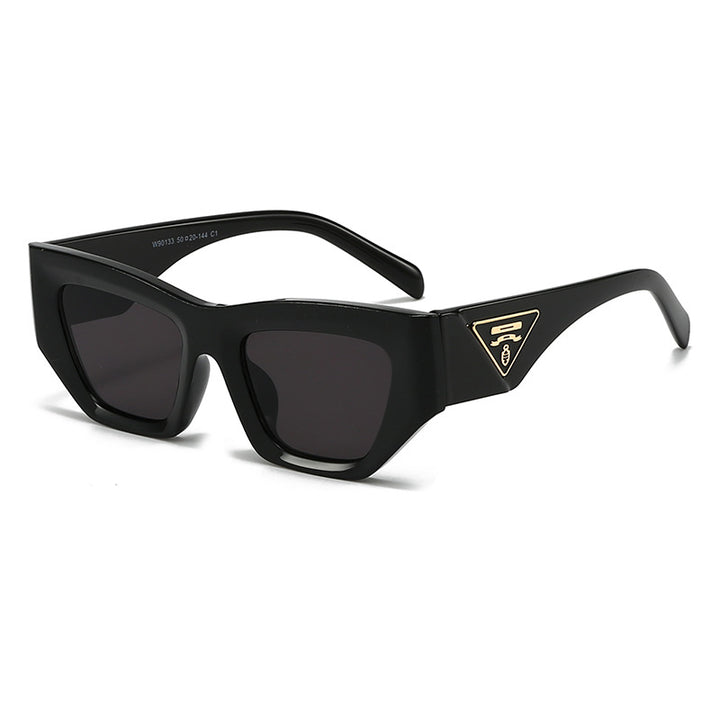 Dame Designer solbrille med moderne, geometrisk ramme Luvikno
