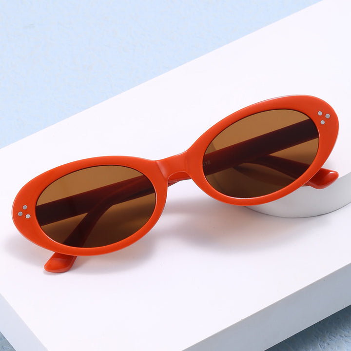 Damer moteriktig solbrille i elegant ovalt design Luvikno