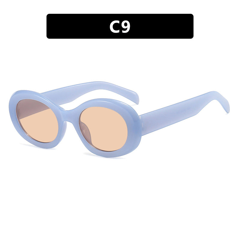 Dame moteriktig solbrille i original oval design med transparent ramme og UV-beskyttelse Luvikno