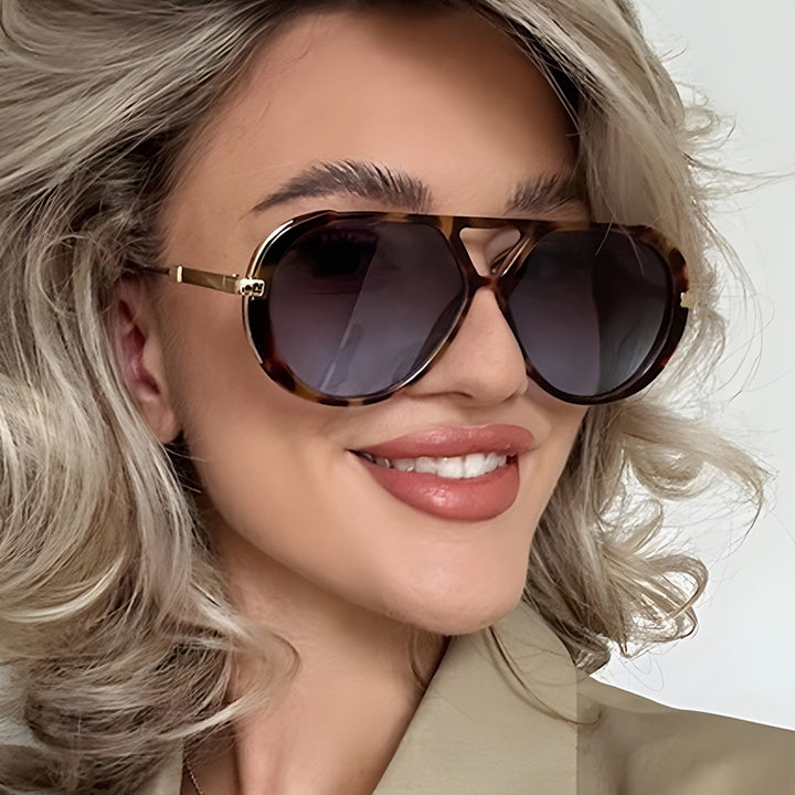 Dame fashionable solbriller i elegant pilotenstil Luvikno