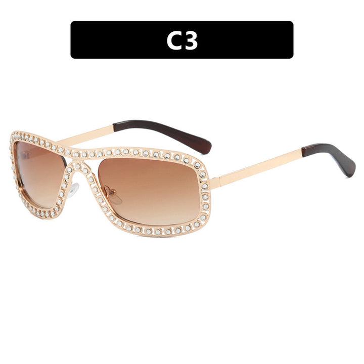 Dame moteriktig solbrille med glitrende ramme Luvikno