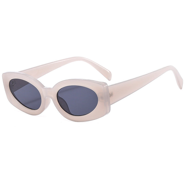 Dame moteriktig solbrille med unikt, bølget ramme Luvikno