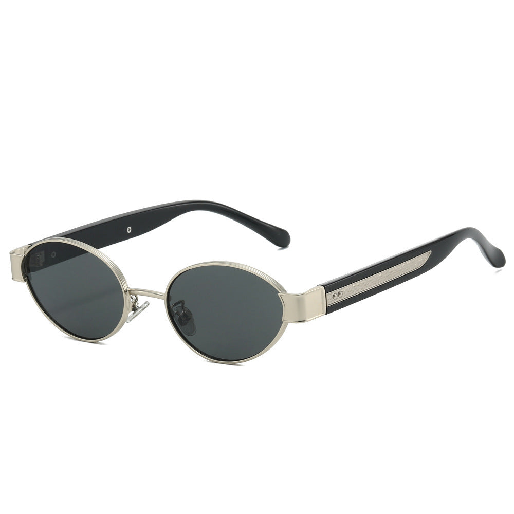 Dame solbrille i moderne, ovale ramme med harmonisk fargekombinasjon Luvikno