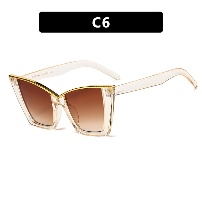 Dame ekstravagant solbrille med unik design og gullige aksenter Luvikno