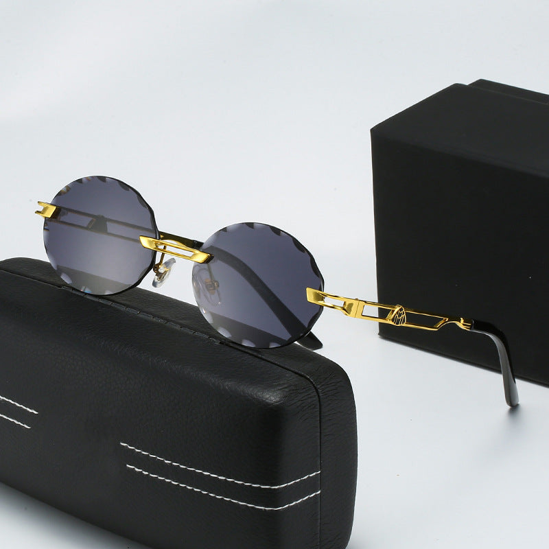 Dame rund solbrille med unikt bølgedesign og høykvalitets metallramme Luvikno
