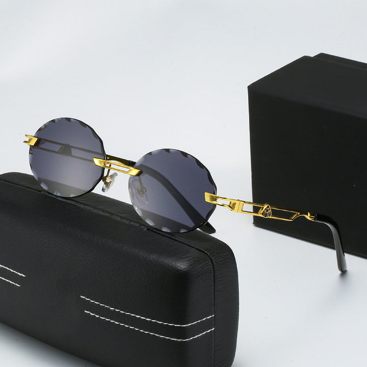 Dame rund solbrille med unikt bølgedesign og høykvalitets metallramme Luvikno