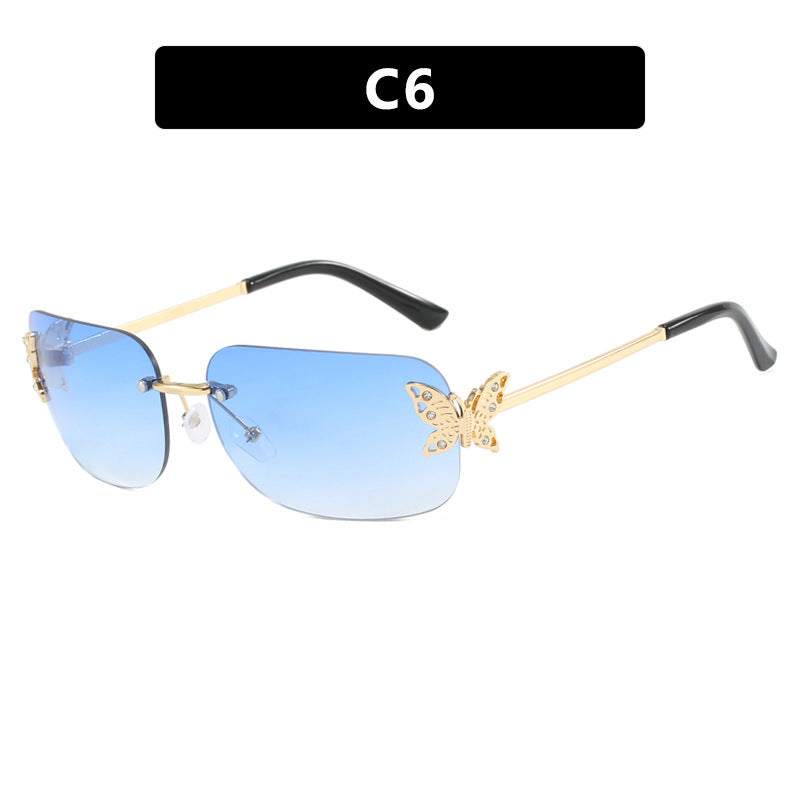 Dame moteriktig solbrille med filigran sommerfugldesign og beskyttende glass Luvikno