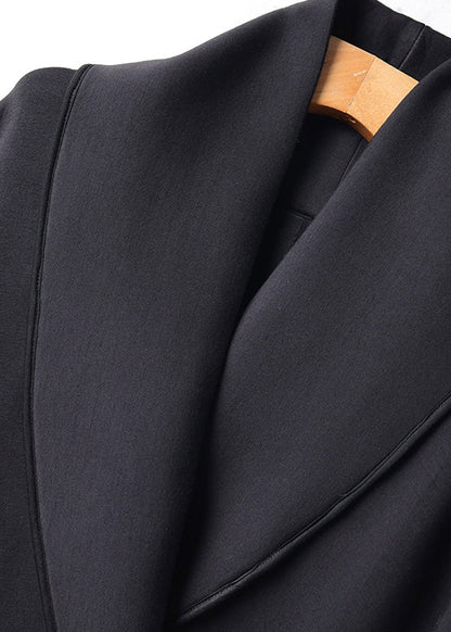 Luvik | Peter Pan kaulus musta nappi puuvillasta takit lepakkohihoilla