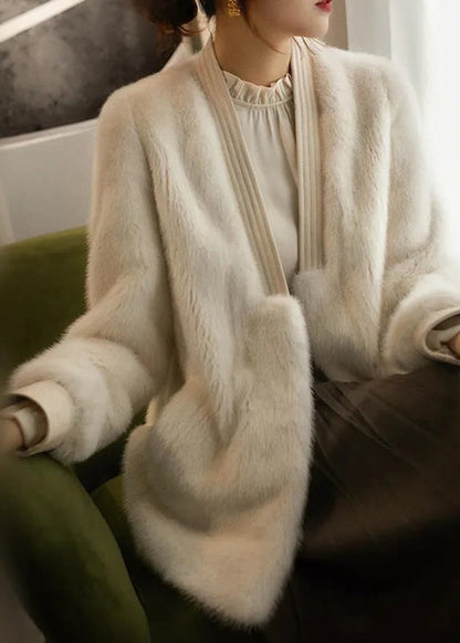 Luvik | Värillä Beige V-pääntie Ruiskeet turkis Pitkät hihat