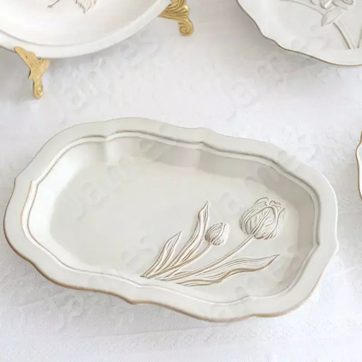 Franske pregete blomsterplater