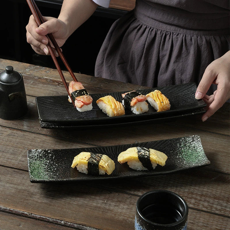 Minimalistiske sushi-tallerkener Luvikno