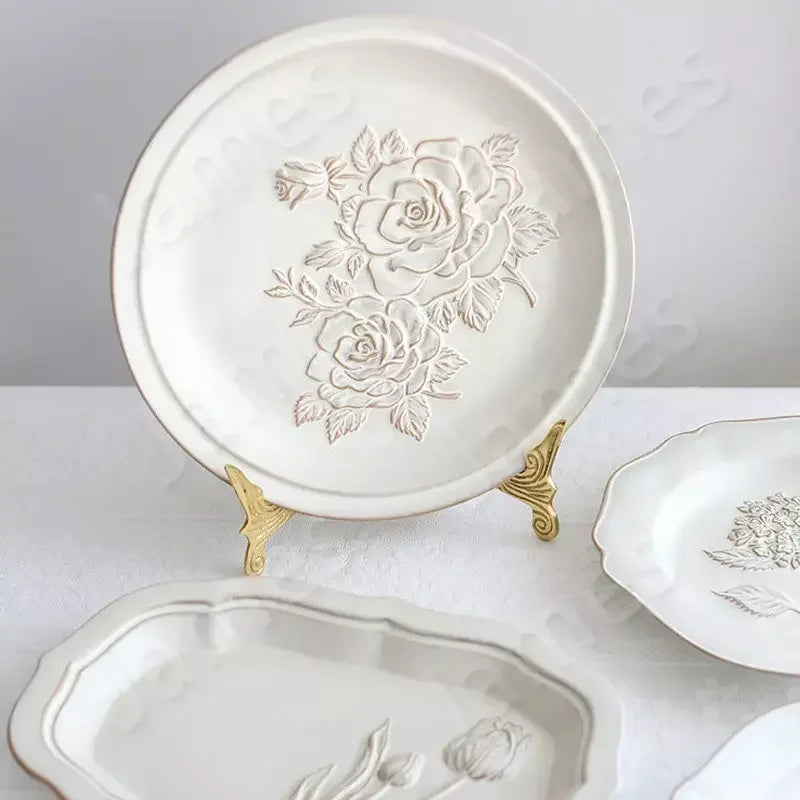 Franske pregete blomsterplater