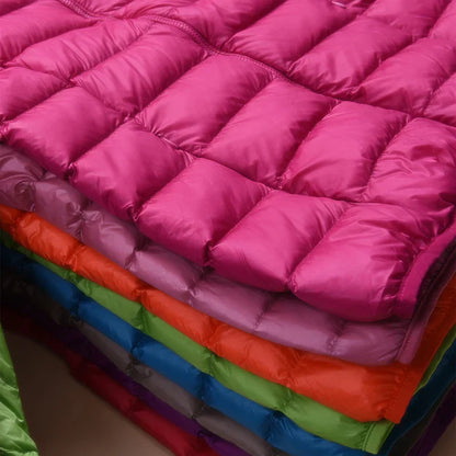 Luvik | Ultralyse Naisten Untuvatakki huoodilla