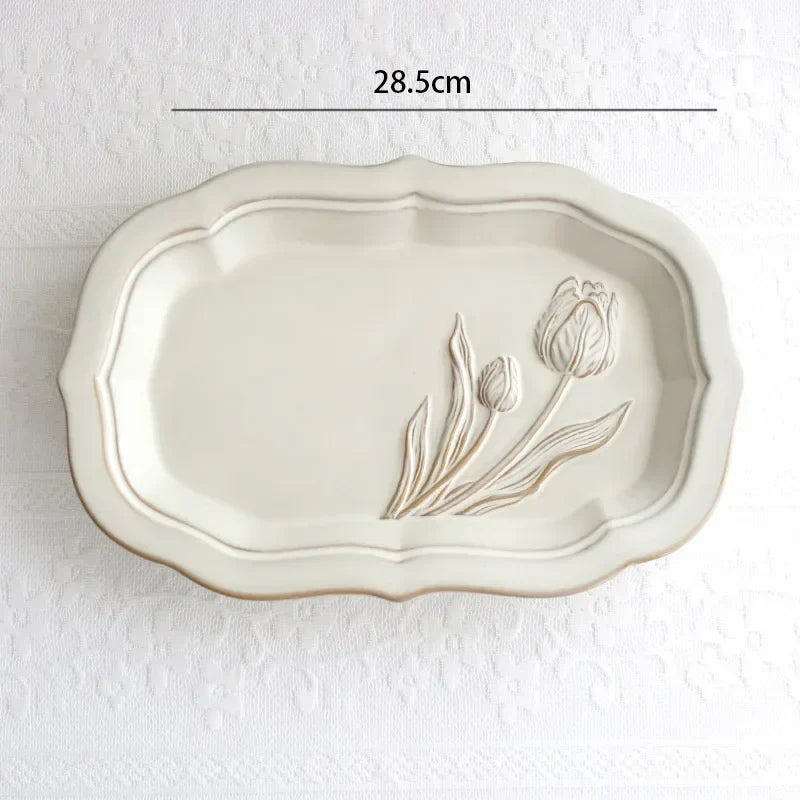 Franske pregete blomsterplater