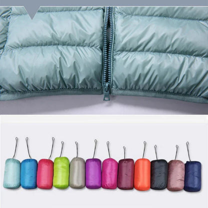 Luvik | Ultralyse Naisten Untuvatakki huoodilla