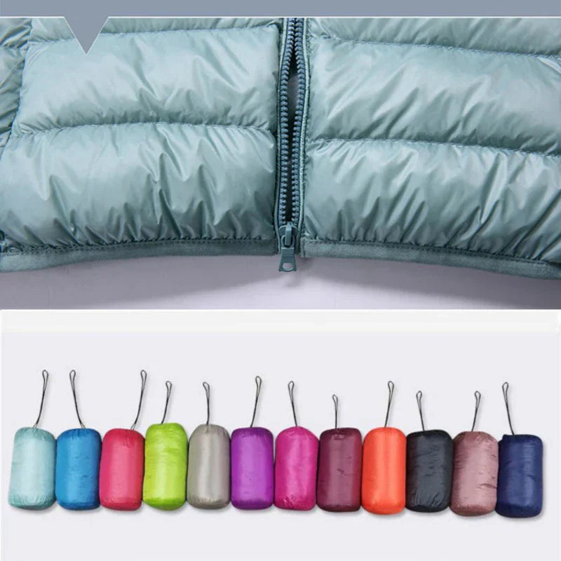 Luvik | UltraKevyt Naisten Untuvatakki Hupulla